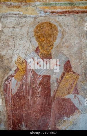 Peinture antique de saint sur le mur d'une église orthodoxe grecque, fresque peinte sur le mur du monastère de Skopiotissa à Zakynthos, Grèce Banque D'Images