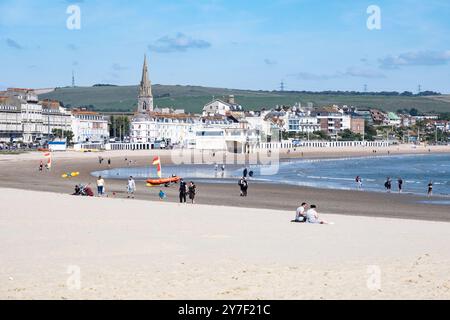 Vacanciers sur la plage de Weymouth, Dorset sur la côte sud d'Englands. Banque D'Images