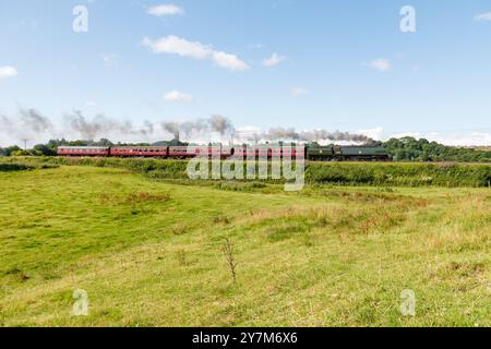 34092 Wells avec un train de voyageurs sur l'East Lancs Railway Banque D'Images