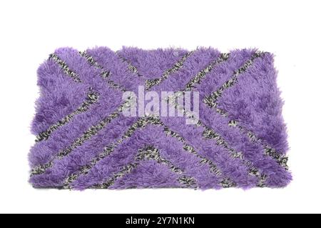 Tapis violet sur fond blanc Banque D'Images