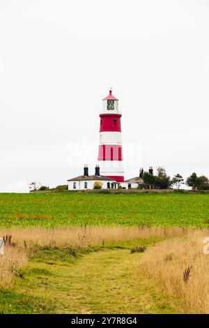 Phare rouge et blanc à Happisburgh, Norfolk, Angleterre. Banque D'Images
