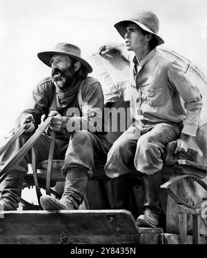 Raymond Guth (à gauche), Gary Grimes (à droite), sur le plateau du film WESTERN, 'The Culpepper Cattle Co.', 20th Century-Fox, 1972 Banque D'Images