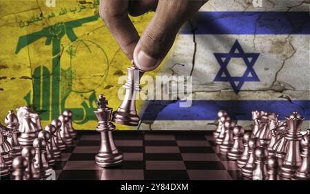 Israël vs Hezbollah concept de drapeau sur échiquier. Guerre entre le Hezbollah et Israël. Conflit entre le Hezbollah et Israël sur des morceaux d'échiquier Banque D'Images