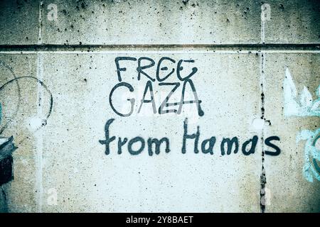 Opinions divergentes sur l'opération militaire israélienne à Gaza : graffiti Free Gaza avec du Hamas à Rothenburgsort, Hambourg, Allemagne, Gespalte Banque D'Images