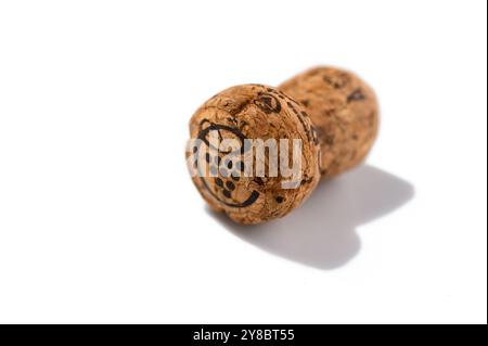 Bouchon de Champagne. Isolé sur fond blanc Banque D'Images