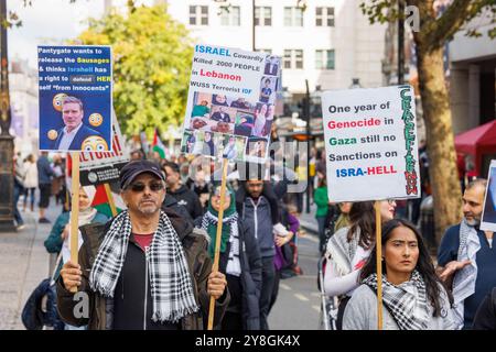 Londres, Royaume-Uni. 5 octobre 2024. Marche pour la Palestine. Les partisans de la Palestine marchent pour mettre fin à la guerre à Gaza. On estime qu'environ 41 000 personnes ont été tuées à Gaza, dont environ la moitié sont des enfants. Ils appellent à un cessez-le-feu immédiat et à la fin des attaques contre le Liban. La contre-manifestation israélienne demande la libération immédiate des otages après le massacre du 7 octobre. Crédit : Karl Black/Alamy Live News Banque D'Images