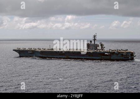 Océan Pacifique, eaux internationales. 03 octobre 2024. L'U. Porte-avions de classe Nimitz de la S Navy USS Theodore Roosevelt lors d'opérations de routine sur l'océan Pacifique, le 3 octobre 2024 dans les eaux internationales. Crédit : MC2 Andrew Benvie/U.S. Navy/Alamy Live News Banque D'Images