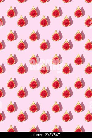 Un motif vibrant de figues fraîches coupées en deux, affiché sur un fond rose clair doux, parfait pour les motifs sur le thème de la nourriture, les textiles ou le dos créatif Banque D'Images