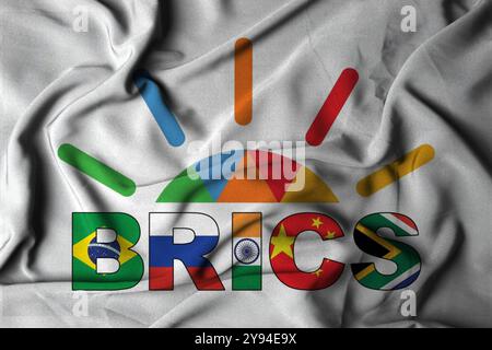 Pringsewu, Lampung 10 octobre 2024 Focus sélectif agitant le drapeau de texture du tissu BRICS. drapeau original, illustration 3d. Banque D'Images