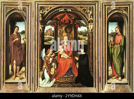 MEMLING, Hans (né vers 1440, Seligenstadt, d. 1494, Bruges) Triptyque vers 1485 huile sur bois, 69 x 47 cm (central), 63,5 x 18,5 cm chaque aile) Kunsthistorisches Museum, Vienne le triptyque avec la Vierge et l'enfant intronisé à Vienne doit avoir été peint avant 1488. Le donateur actuel, vêtu d’un tabard sombre, n’est pas de Memling et cache une autre figure qui s’avère n’être autre que l’abbé Jan Crabbe, décédé en 1488. Les ailes montrent les deux St Johns avec les figures «vivantes» d'Adam et Eve dans des niches à l'extérieur (vues lorsque les ailes sont fermées). Pour la première fois le PAI Banque D'Images
