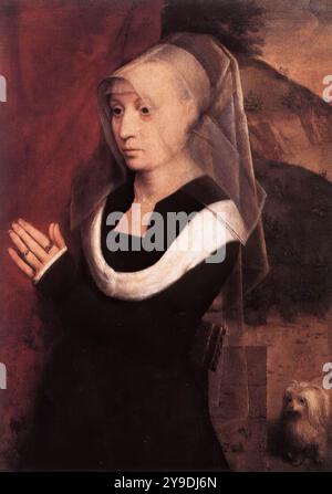 MEMLING, Hans (né vers 1440, Seligenstadt, d. 1494, Bruges) donateur vers 1490 huile sur panneau de chêne, 44,7 x 32,4 cm Musée national d'art, Bucarest Un certain nombre de correspondances, y compris les dimensions, les origines et les inscriptions prouvent que les trois fragments à Bucarest (la Vierge debout et l'enfant et les deux panneaux avec donateurs) se rejoignent. Ils ont été coupés à la taille correspondante évidemment avant 1656. La Vierge, qui est clairement debout lorsqu'elle atteint la hauteur des chapiteaux de colonne et n'a pas l'enfant sur ses genoux, a été coupée en deux. Les donneurs, qui sont agenouillés, ont été tr Banque D'Images