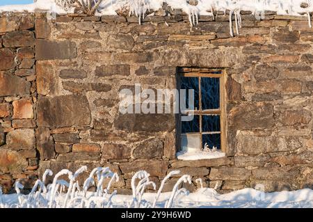 Maison croft abandonnée dans la neige sur l'île de Lewis Banque D'Images