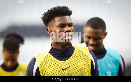 Bruxelles, Belgique. 13 octobre 2024. Le Français Aurelien Tchouameni photographié lors d'une séance d'entraînement de l'équipe nationale de France de football, au stade Roi Baudoin, à Bruxelles, dimanche 13 octobre 2024. L’équipe nationale française affrontera demain les Red Devils, pour l’UEFA Nations League 2025. BELGA PHOTO VIRGINIE LEFOUR BELGA PHOTO VIRGINIE LEFOUR crédit : Belga News Agency/Alamy Live News Banque D'Images