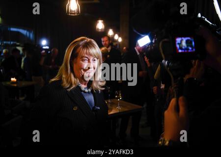 Vilnius, Lituanie. 13 octobre 2024. Vilija Blinkeviciute, chef du Parti social-démocrate lituanien (LSDP), s’adresse aux médias lors d’une élection. Le vote au premier tour des élections législatives en Lituanie est terminé. Les premiers résultats du dépouillement des votes montrent que le Parti social-démocrate lituanien (LSDP), parti d'opposition, est en tête. (Photo de Yauhen Yerchak/SOPA images/SIPA USA) crédit : SIPA USA/Alamy Live News Banque D'Images