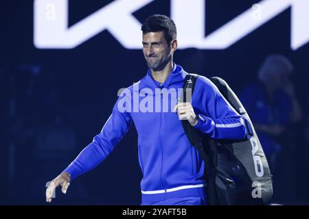 MELBOURNE, AUSTRALIE, 11 JANVIER : Novak Djokovic, de Serbie, et Stefanos Tsitsipas, de Grèce, jouent ensemble lors d'un match caritatif avant le 2024 A. Banque D'Images