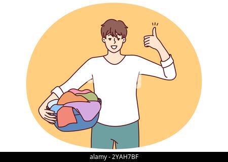 Le porte-ménage homme avec le linge dans le lavabo montre les pouces vers le haut recommandant un détergent à lessive de qualité. Guy se préparer à charger des textiles dans le lave-linge en mettant un exemple positif pour les pairs Illustration de Vecteur