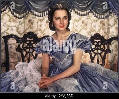 Olivia de Havilland (Melanie). Portrait couleur publicitaire pour le film en emportant le vent (1939). Banque D'Images