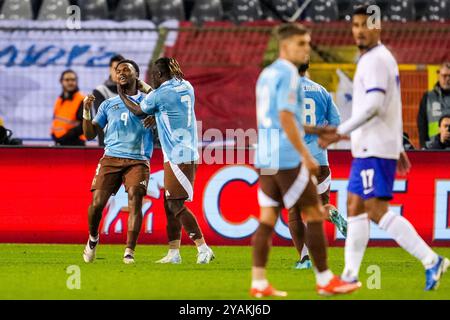 Bruxelles, Belgique. 14 octobre 2024. BRUXELLES, BELGIQUE - 14 OCTOBRE : lois Openda, de Belgique, célèbre avec Jeremy Doku, de Belgique, après avoir marqué le premier but de son équipe lors du match du Groupe A2 de l'UEFA Nations League 2024/25 League A entre la Belgique et la France au stade Roi Baudouin le 14 octobre 2024 à Bruxelles, Belgique. (Photo de René Nijhuis/MB Media) crédit : MB Media solutions/Alamy Live News Banque D'Images