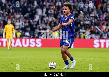 Munich, Allemagne. 14 octobre 2024. MUNICH, ALLEMAGNE - 14 OCTOBRE : Joshua Zirkzee, des pays-Bas, court avec le ballon lors du match du groupe 3 de la Ligue des Nations 2024/2025 de l'UEFA Ligue A entre l'Allemagne et les pays-Bas à l'Allianz Arena le 14 octobre 2024 à Munich, Allemagne. (Photo de Pieter van der Woude/Orange Pictures) crédit : Orange pics BV/Alamy Live News Banque D'Images