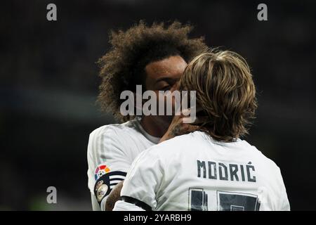 ESPAGNE, Madrid : le défenseur brésilien Marcelo du Real Madrid et le milieu de terrain croate Luka Modric du Real Madrid célèbrent un but en Ligue espagnole 2 Banque D'Images