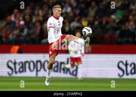 Varsovie, Pologne. 13 octobre 2024. Karol Swiderski de Pologne lors du match de football de la Ligue des Nations de l'UEFA, Ligue A, Groupe A1 entre la Pologne et la Croatie le 15 octobre 2024 au stade PGE Narodowy à Varsovie, Pologne - photo Piotr Matusewicz/DPPI crédit : DPPI Media/Alamy Live News Banque D'Images