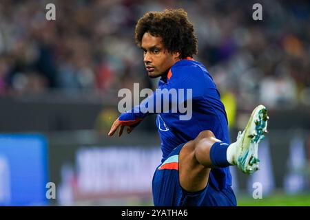 Munich, Allemagne. 14 octobre 2024. MUNICH, ALLEMAGNE - 14 OCTOBRE : Joshua Zirkzee, des pays-Bas, lors du match du Groupe 3 de la Ligue des Nations 2024/2025 de l'UEFA Ligue A entre l'Allemagne et les pays-Bas à l'Allianz Arena le 14 octobre 2024 à Munich, Allemagne. (Photo de Pieter van der Woude/Orange Pictures) crédit : Orange pics BV/Alamy Live News Banque D'Images