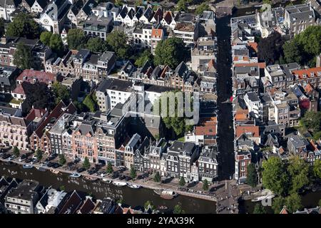 La ceinture des canaux est la partie du centre-ville d'Amsterdam le long des quatre canaux principaux : Singel, Herengracht, Keizersgracht et Prinsengracht. La ceinture de canaux est sur la liste UNESCO des sites du patrimoine mondial. Maisons historiques, appartements, maisons de canal, monuments et commerces sont mêlés dans le centre. pays-bas hors service - belgique hors service Banque D'Images