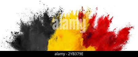 drapeau coloré de la belgique avec explosion de poudre de peinture holi noir jaune et rouge isolé sur fond blanc. national belge europe voyage et Banque D'Images