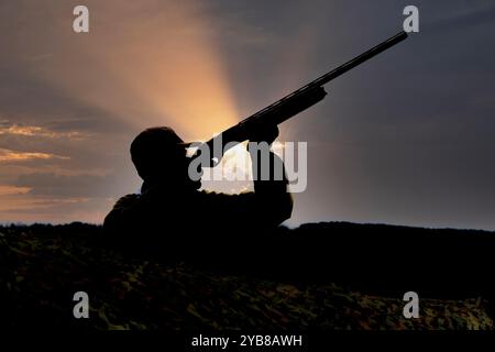 chasseur de sauvagine tirant des oiseaux Banque D'Images