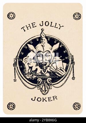 Illustration de cartes à jouer 'le Joker Jolly' montrant un bouffon tenant des cartes à jouer, jouant Whist. Photographie d'une terrasse originale française du début du XXe siècle. Banque D'Images