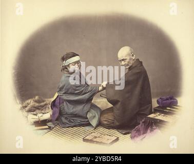 Médecin et patient japonais, 1868. Deux figures assises avec le mâle examinant le bras de la femelle. Banque D'Images