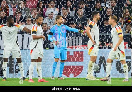 Oliver Baumann, DFB 1, Nico Schlotterbeck, DFB 15 Antonio Ruediger, DFB 2 Tim Kleindienst, DFB 9 dans l'UEFA Nations League 2024 match ALLEMAGNE - PAYS-BAS 1-0 dans la saison 2024/2025 le 14 octobre 2024 à Munich, Allemagne. Photographe : ddp images / STAR-images Banque D'Images