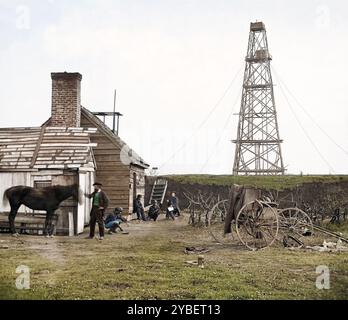 Un photographe en résidence se tient avec son cheval. Chariot photographique visible sur la droite. Prise à Butler's signal Tower, une station du signal corps, à point Rocks, Appomatox River, Bermuda Hundred, Virginie, 1864. un groupe d'officiers en uniforme est visible à l'arrière-plan. Montre un homme afro-américain squattant avec signal corps. Photographie du principal théâtre de guerre oriental, l'armée de la James, juin 1864-avril 1865. Banque D'Images