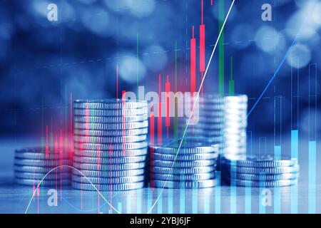 Trading de devises. Pièces et graphiques empilés, tonifiés en bleu Banque D'Images