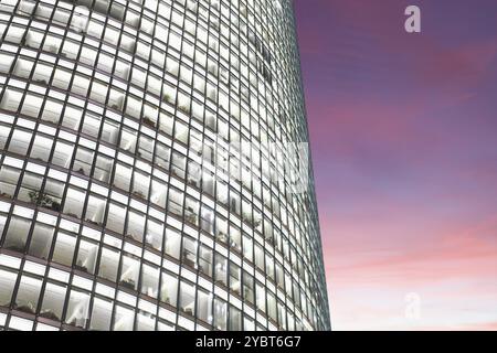 Bureau moderne la nuit, montrant l'activité quotidienne des employés de bureau Banque D'Images