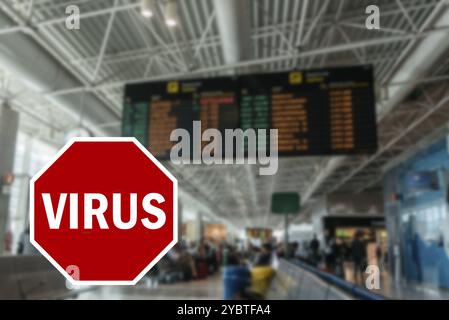 Le concept de pandémie de coronavirus de Wuhan avec UN panneau STOP avec le mot virus superposé au terminal aéroportuaire non identifiable a délibérément quitté le terminal aéroportuaire de Focus Banque D'Images