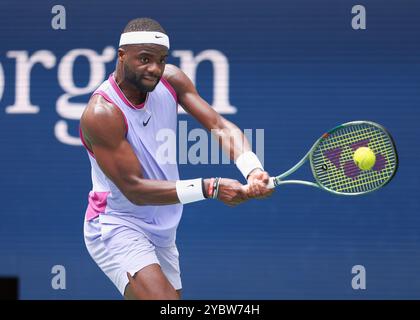 La joueuse de tennis Frances Tiafoe en action aux US Open 2024 Championships, Billie Jean King Tennis Center, Queens, New York, États-Unis. Banque D'Images