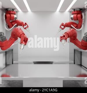 Un espace pour exposer des produits sur une surface de table métallique avec des bras robotisés rouges qui l'entourent dans une usine moderne. Fabrication automatisée. machine Banque D'Images