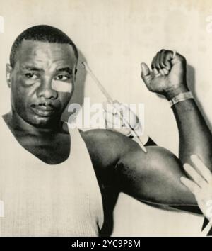 Boxeur professionnel américain Sonny Liston après le match avec Cassius Clay, 1964 Banque D'Images