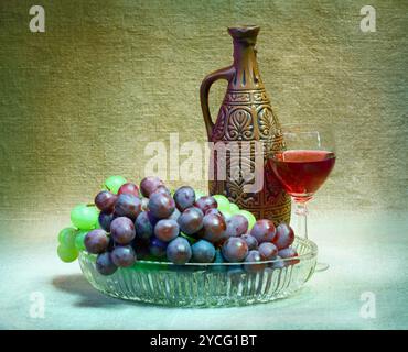 Nature morte de raisins, bouteille et verre de vin Banque D'Images