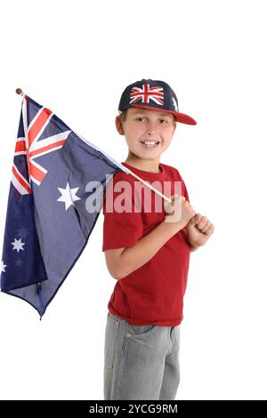 Enfant patriotique tenant un drapeau australien Banque D'Images