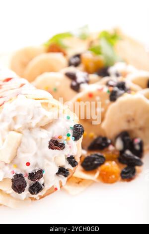 Galettes roulées avec crème sucrée et fruits Banque D'Images