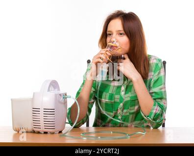 Femme avec inhalateur Banque D'Images