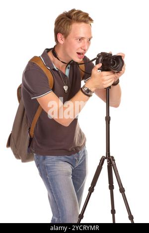 Closeup portrait of a young man taking a photo sur fond blanc Banque D'Images