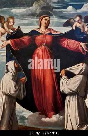 Stendardo dei disciplini : Madonna della Misericordia e due disciplini . olio su tela - Alessandro Bonvicino detto Moretto - 1524 - Possagno (TV) Tempi Banque D'Images