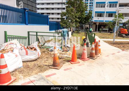 Travaux routiers à Marine Parade, Singapour Banque D'Images