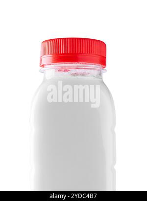 Bouteille de yogourt en plastique blanc avec bouchon rouge fermé Banque D'Images