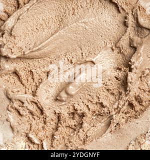 Texture de crème glacée au café, fond carré. Gros plan sur la glace brune au café maison. Banque D'Images