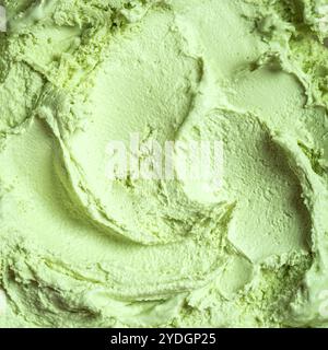 Texture de crème glacée à la pistache, fond carré. Glace végétalienne verte maison ou glace en gros plan. Banque D'Images