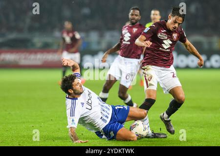 Samuele Ricci du Como 1907 Patrick Cutrone Torino FC en action lors du match de football Serie A Enilive 2024/2025 entre Turin et Côme au s. Banque D'Images